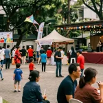 Acara komunitas Leci123 yang meriah di taman kota dengan makanan lokal dan aktivitas masyarakat.